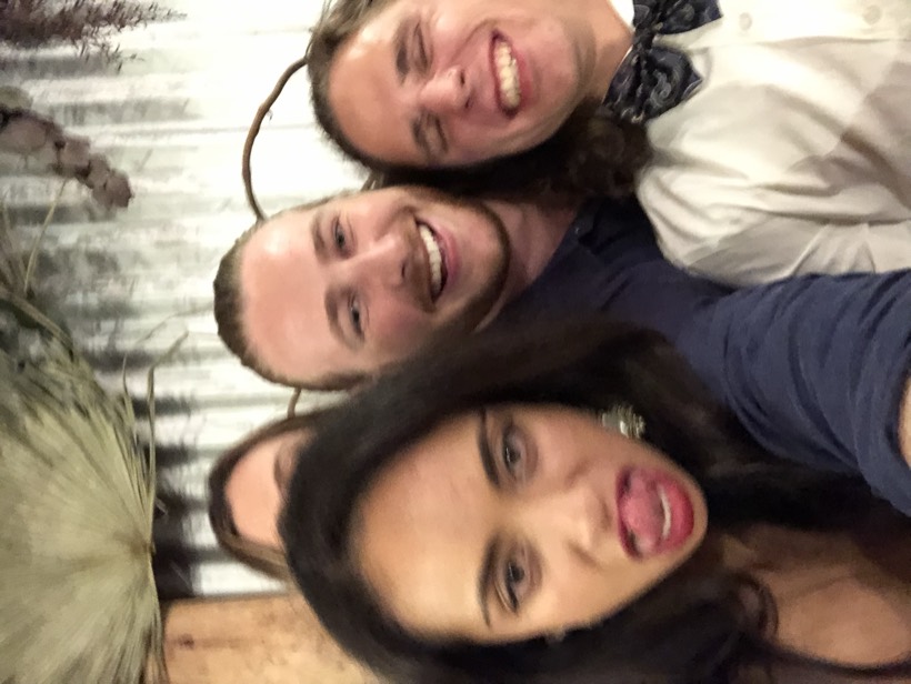 A close playful selfie with Brittany, Deklan, and friends laughing.